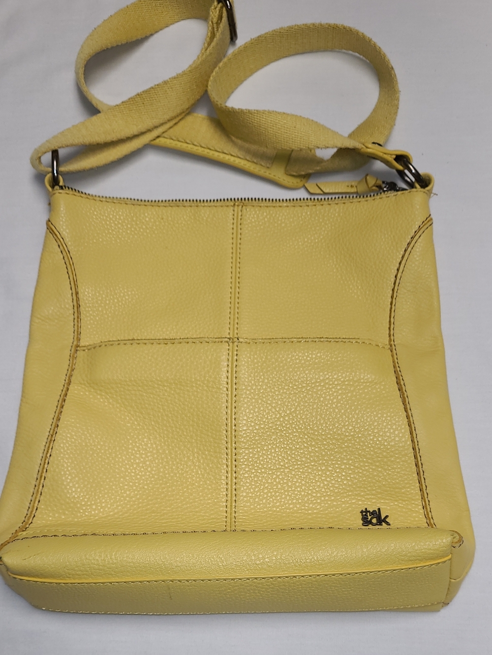 The Sak Buttercup Yellow Pebbled textured Leather Crossbody Bag adjustable strap